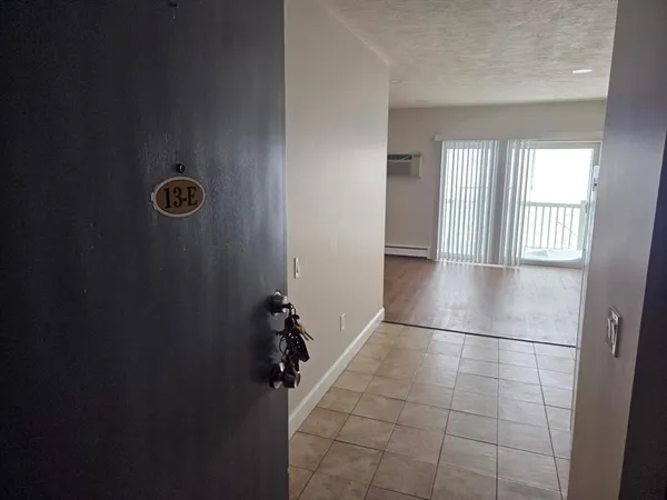 a view of empty room with windows