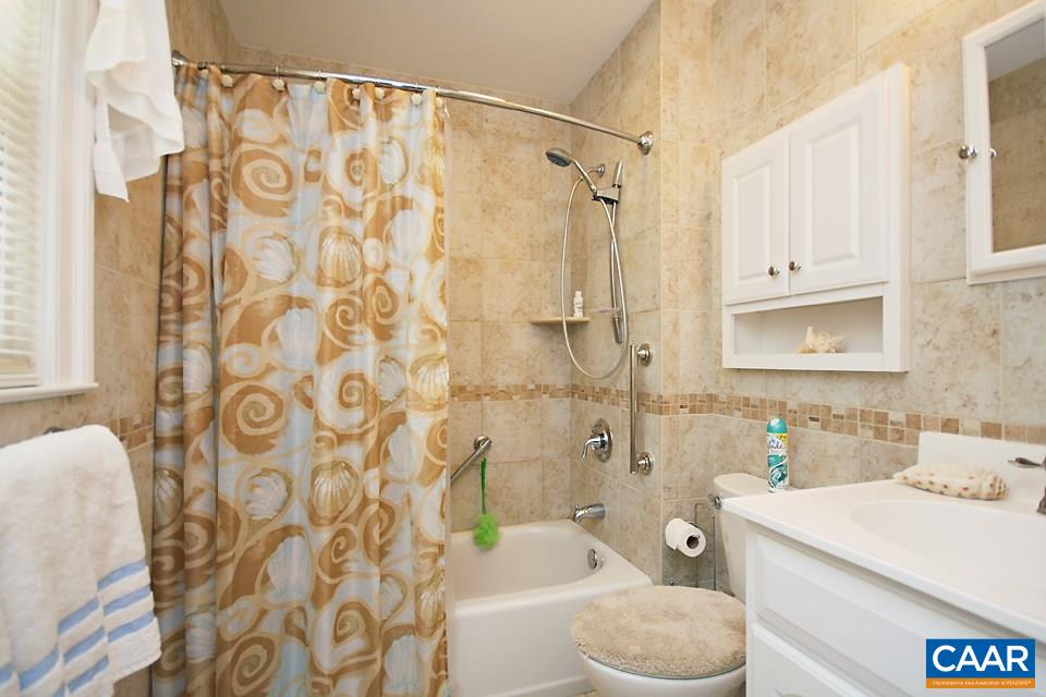 2709 Northfield Road Charlottesville, VA 22901 - Photo 15 of 32 a bathroom with a sink toilet and shower