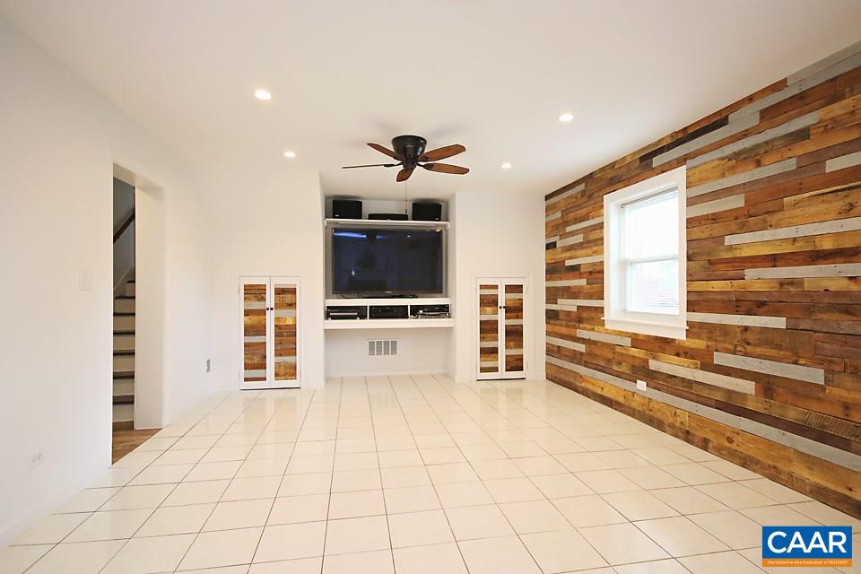 2709 Northfield Road Charlottesville, VA 22901 - Photo 22 of 32 a living room with furniture and flat screen tv