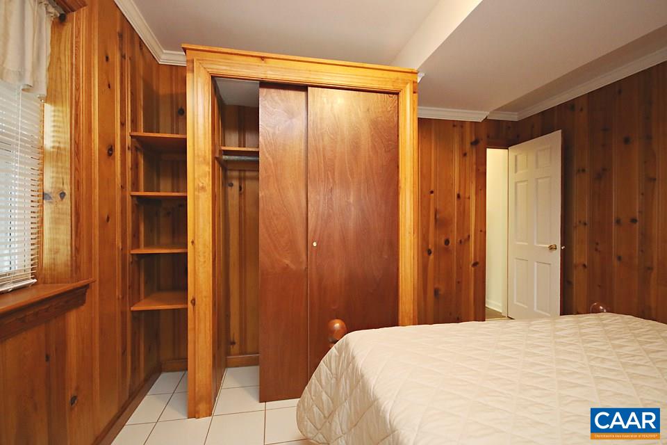 2709 Northfield Road Charlottesville, VA 22901 - Photo 24 of 32 a bedroom with a bed and a window