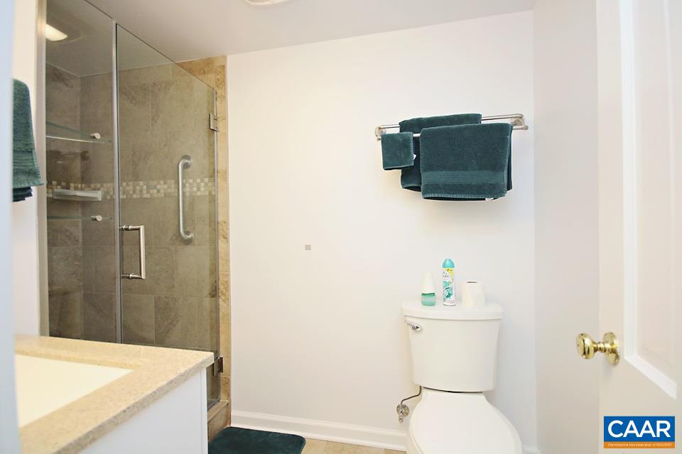 2709 Northfield Road Charlottesville, VA 22901 - Photo 25 of 32 a bathroom with a sink a toilet and shower
