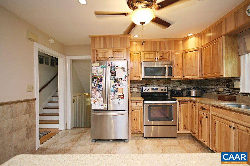 2709 Northfield Road Charlottesville, VA 22901 - Photo 7 of 32 a kitchen with stainless steel appliances a stove a refrigerator and a sink