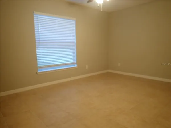 an empty room with a window