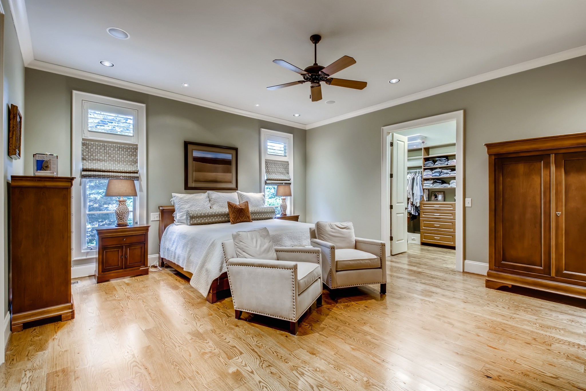 3919 Dorcas Drive Nashville, TN 37215 - Photo 18 of 40 a spacious bedroom with a bed and a chandelier