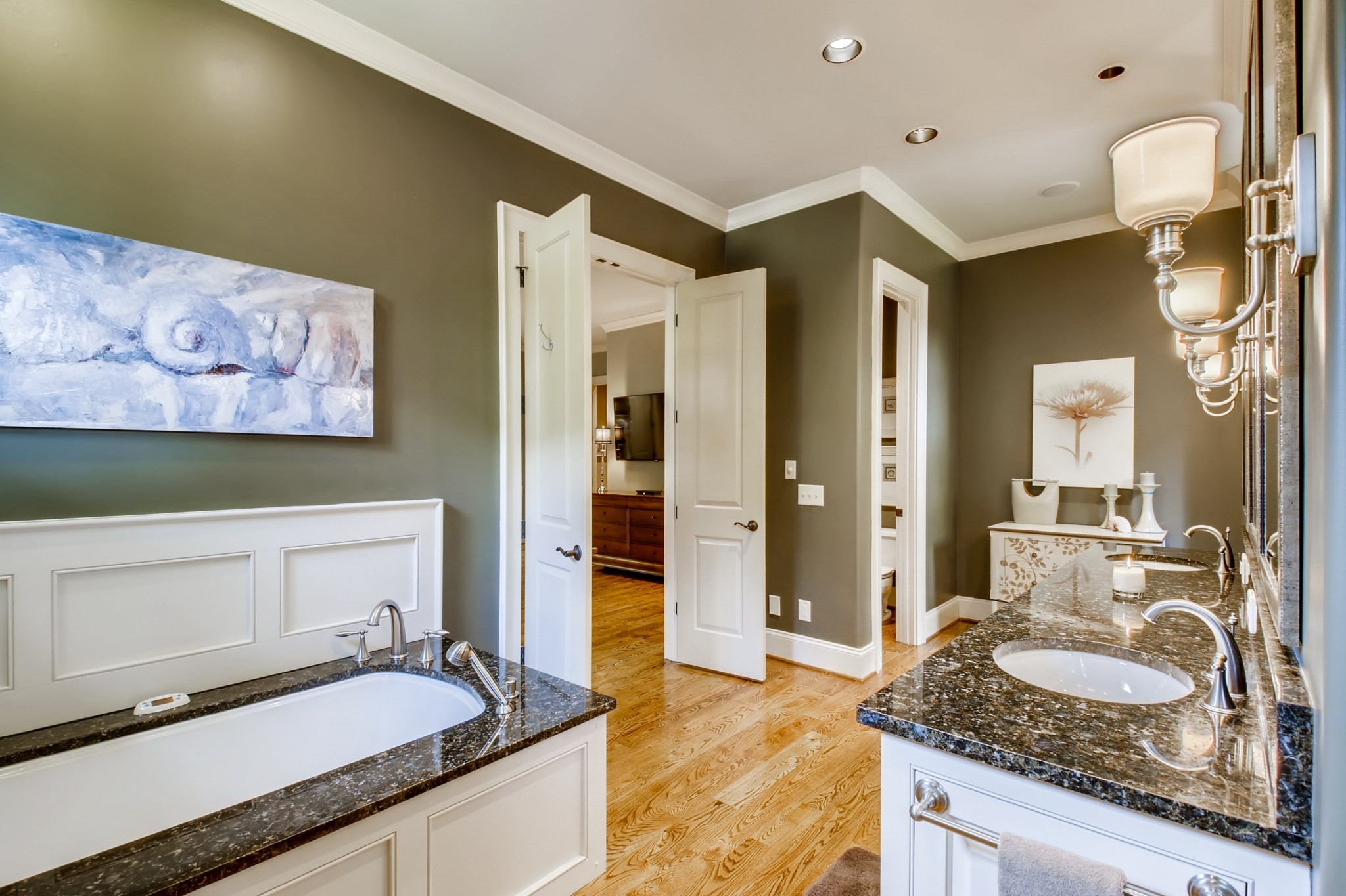 3919 Dorcas Drive Nashville, TN 37215 - Photo 23 of 40 a spacious bathroom with a granite countertop sink and a mirror