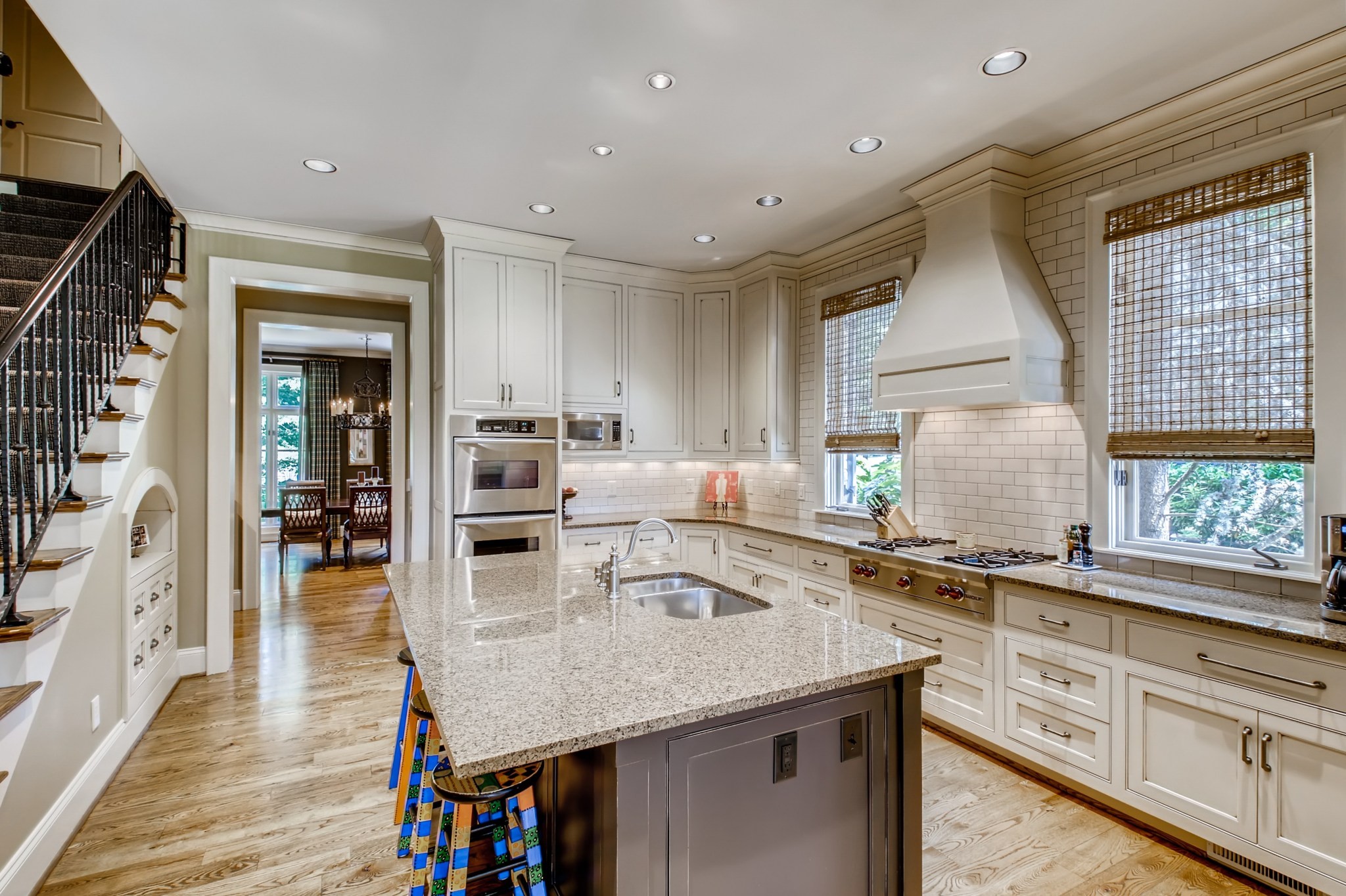 3919 Dorcas Drive Nashville, TN 37215 - Photo 9 of 40 a kitchen with counter top space cabinets and wooden floor