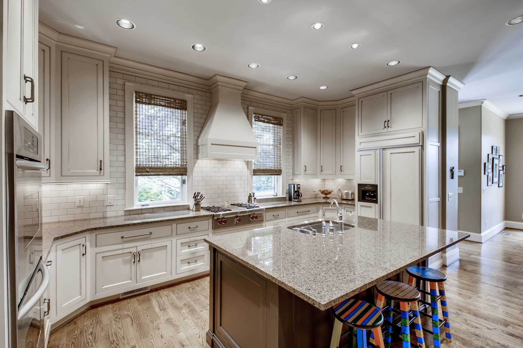 3919 Dorcas Drive Nashville, TN 37215 - Photo 10 of 40 a kitchen with stainless steel appliances granite countertop a sink a stove and a refrigerator