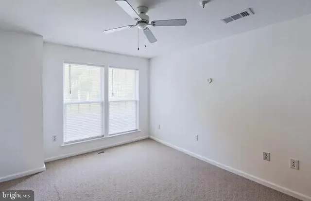 a view of balcony with furniture