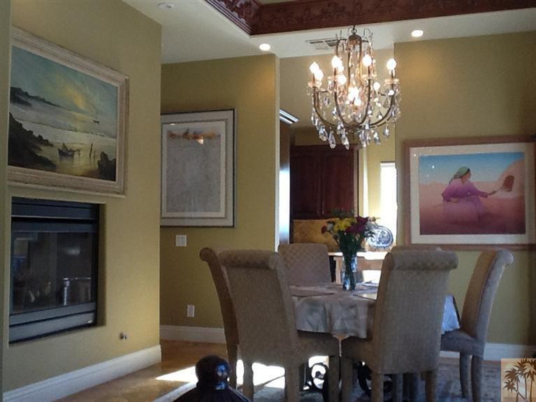 71936 Vista Del Rio Rancho Mirage, CA 92270 - Photo 11 of 17 a view of a dining room with furniture and chandelier