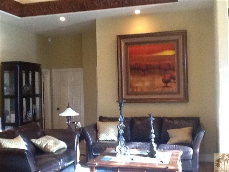 71936 Vista Del Rio Rancho Mirage, CA 92270 - Photo 14 of 17 a living room with furniture and a fireplace