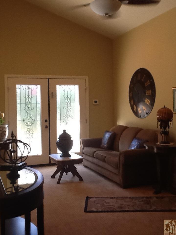 71936 Vista Del Rio Rancho Mirage, CA 92270 - Photo 16 of 17 a living room with furniture a window and a floor