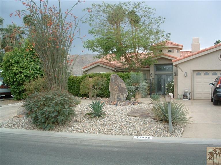 71936 Vista Del Rio Rancho Mirage, CA 92270 - Photo 2 of 17 a backyard of a house with outdoor seating