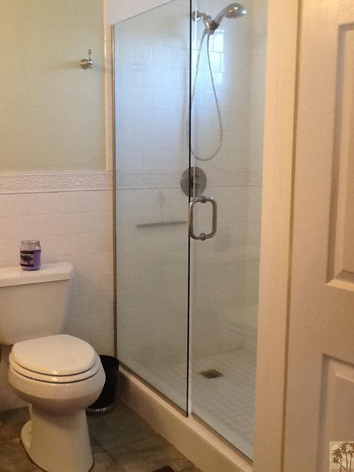 71936 Vista Del Rio Rancho Mirage, CA 92270 - Photo 7 of 17 a bathroom with a toilet and shower