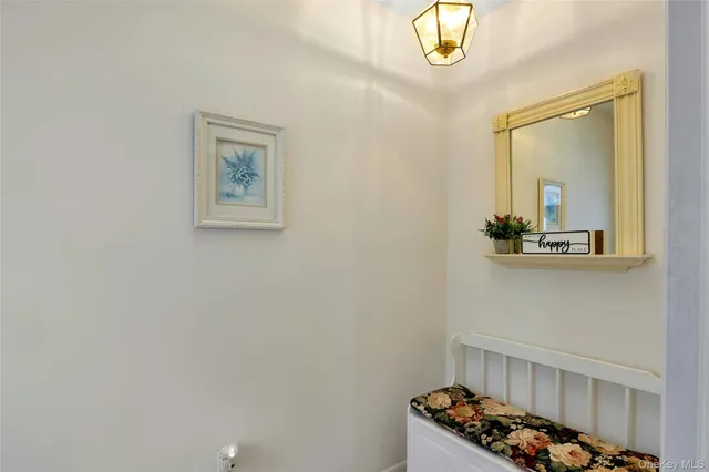 a bathroom with a sink a mirror and vanity