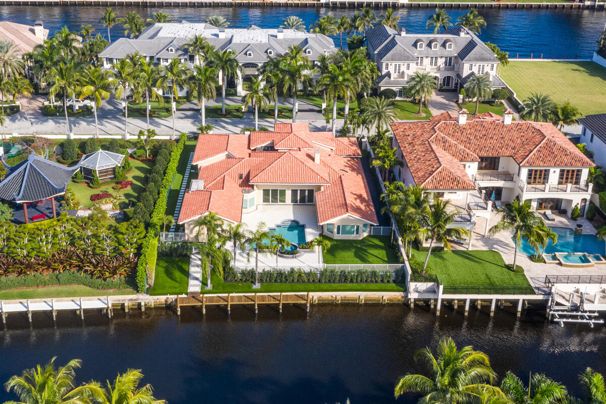 533 East Alexander Palm Road Boca Raton, FL 33432 - Photo 2 of 44 an aerial view of residential houses with outdoor space and swimming pool