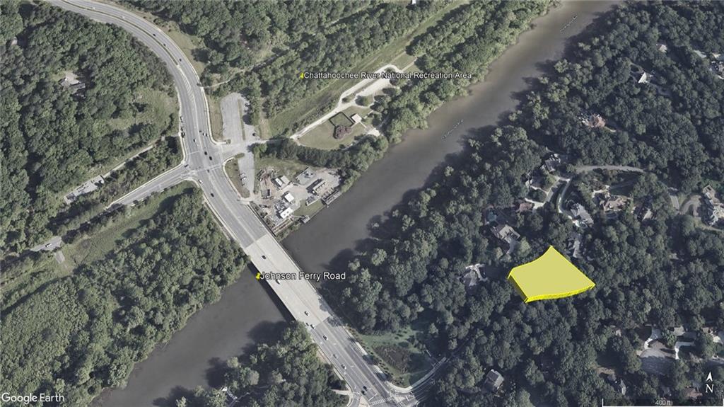 Lot 6 North Riverside Circle Atlanta, GA 30328 - Photo 2 of 11 a aerial view of house with yard and swimming pool