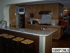 3326 Colony Road Charlotte, NC 28211 - Photo 3 of 8 a kitchen with a sink and cabinets