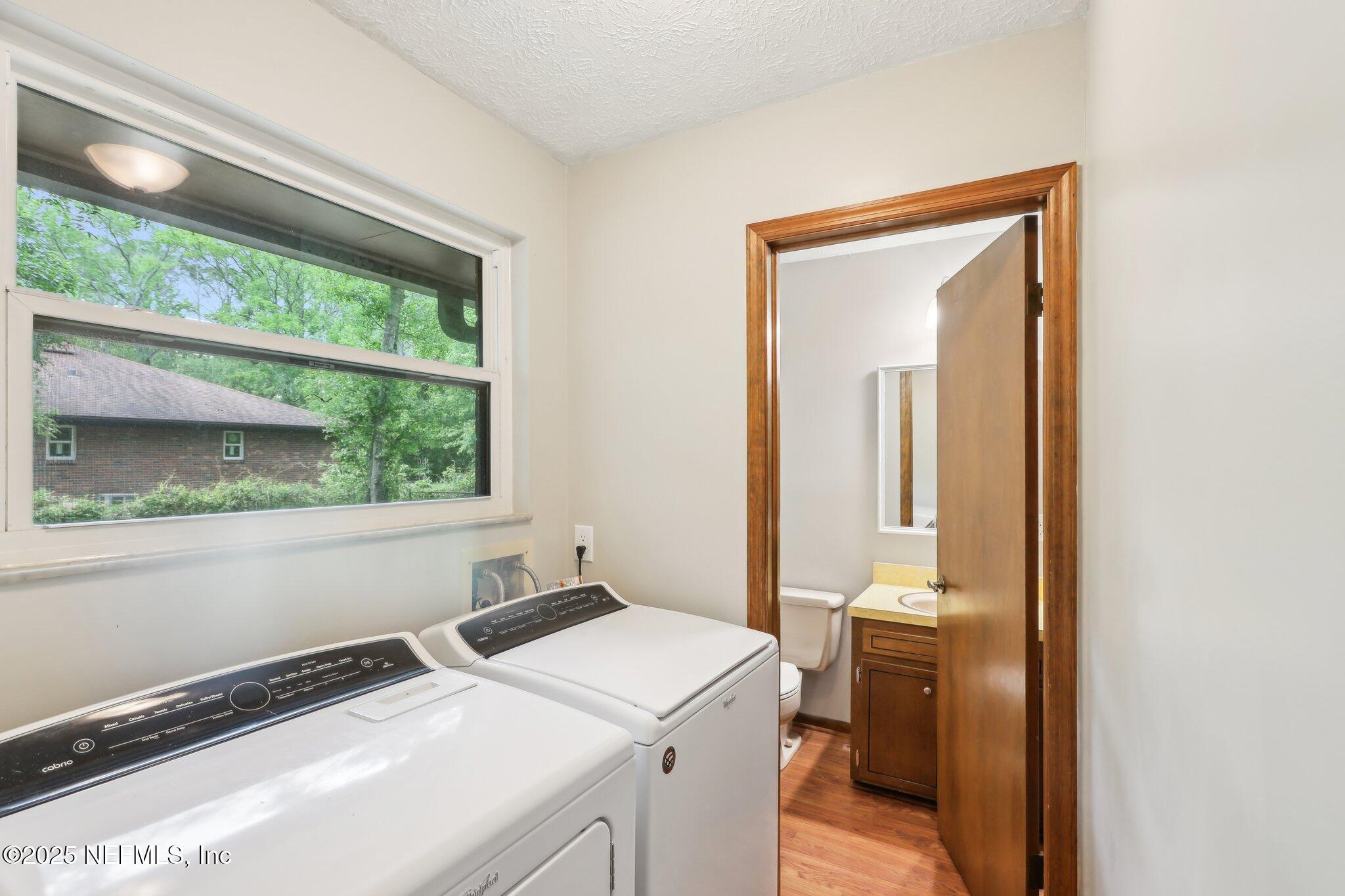 14163 Blanche Road Jacksonville, FL 32223 - Photo 33 of 58 Laundry Area with 1/2 Bath