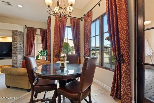 a bathroom with a granite countertop sink a mirror and a shower