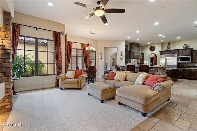 a bathroom with a toilet a sink and a mirror