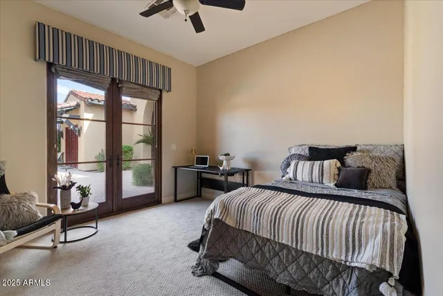 a view of a car park in front of a house