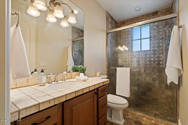 a view of a swimming pool with an outdoor seating