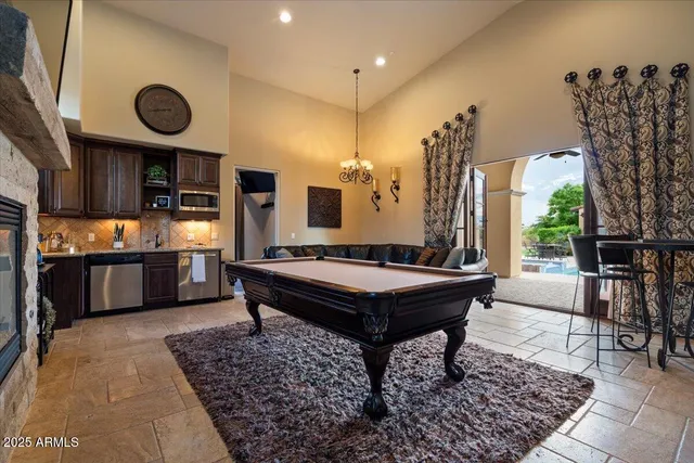 a view of a swimming pool with a yard