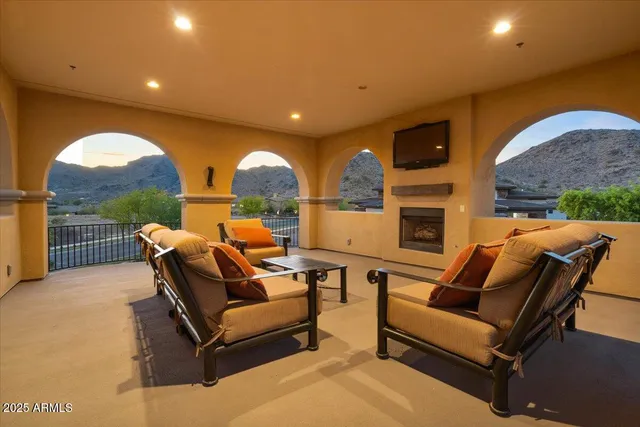 a outdoor living space with patio furniture and a potted plant