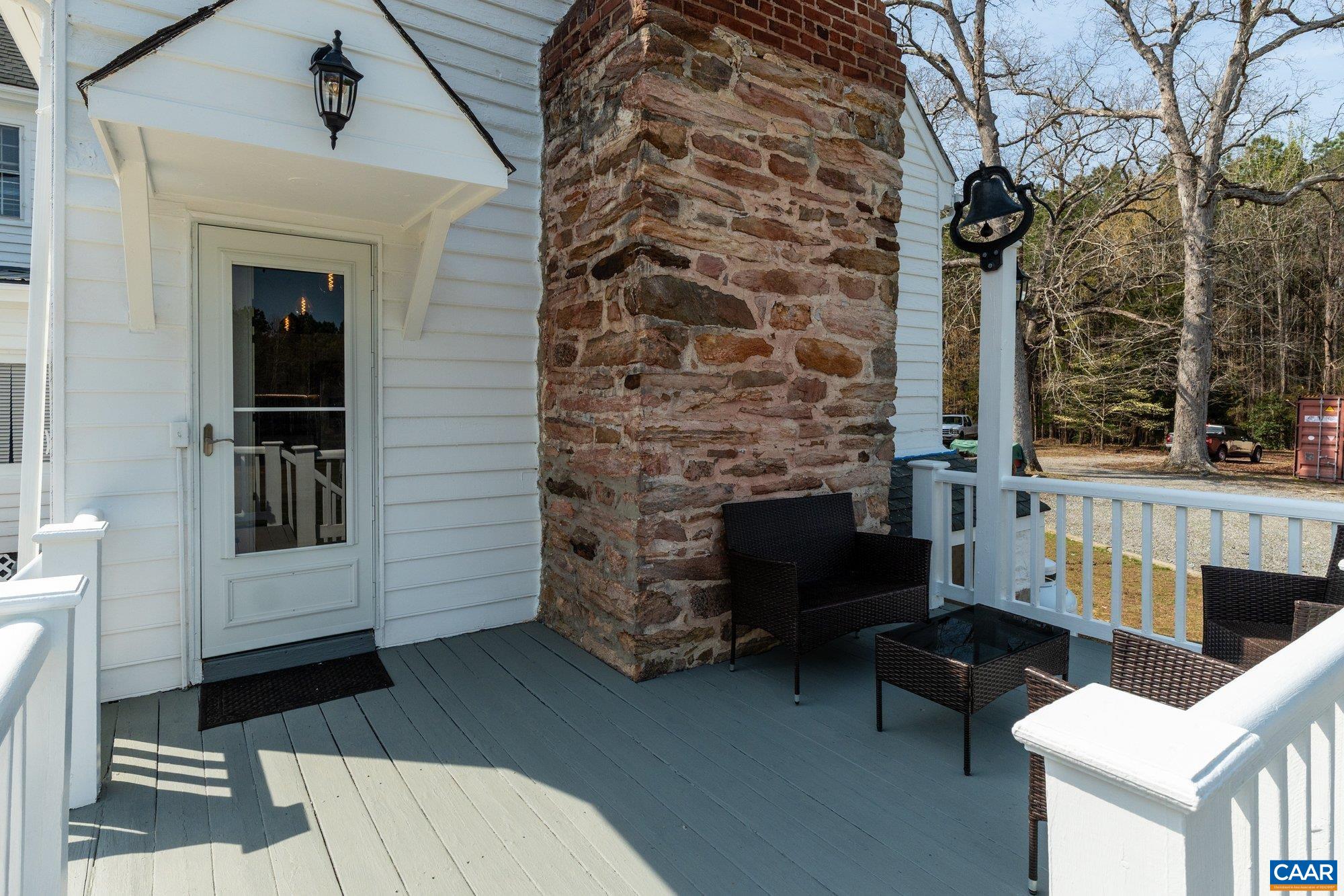 14910 Western Mill Road Lawrenceville, VA 23868 - Photo 58 of 73 a view of a porch with furniture and a fireplace