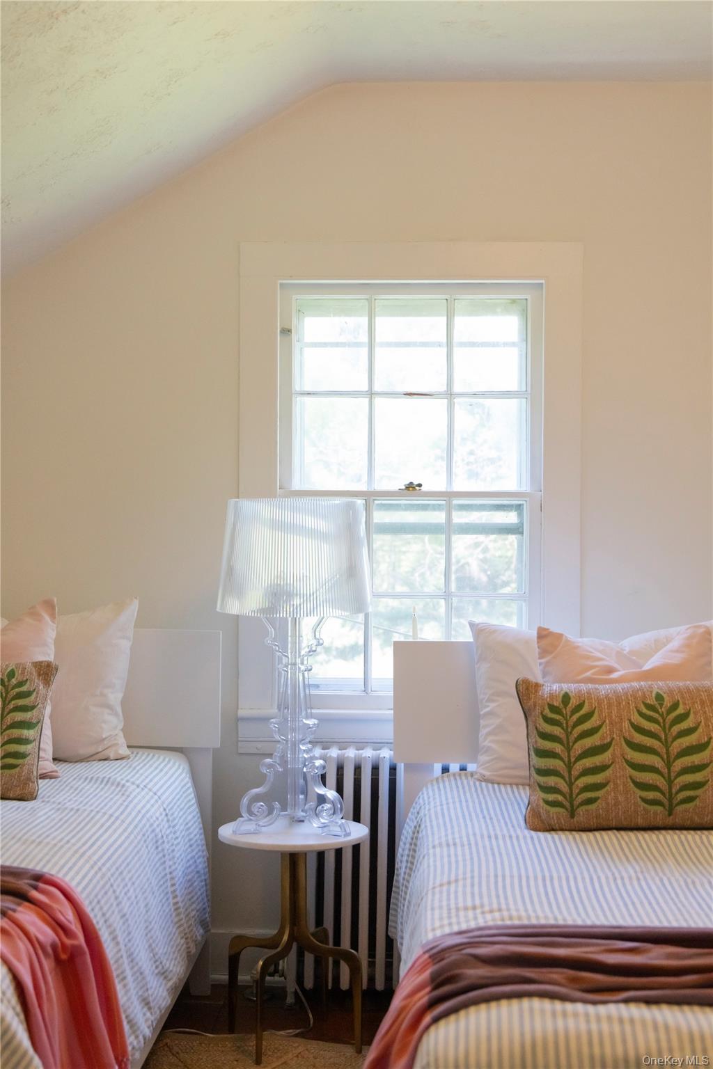 210 Middle Road Hudson, NY 12534 - Photo 34 of 42 Bedroom featuring a single-pane window, white window trim, and a sloped ceiling
