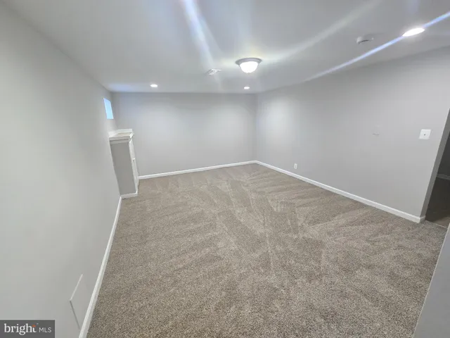 an empty room with a natural light