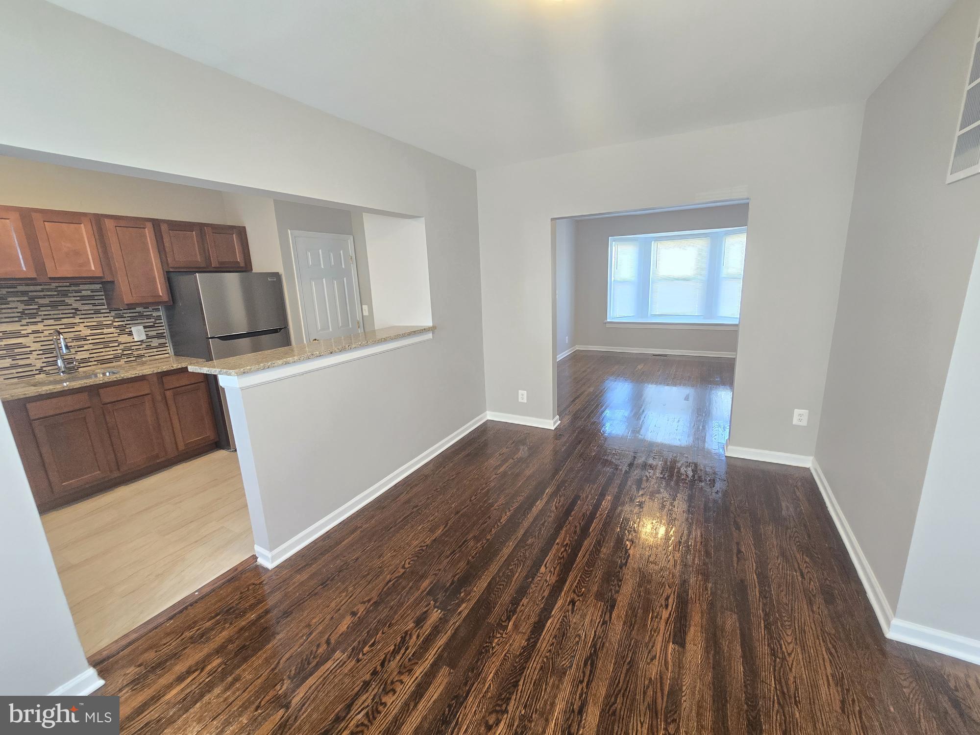 2805 Edison Highway Baltimore, MD 21213 - Photo 8 of 28 a view of a kitchen from the hallway