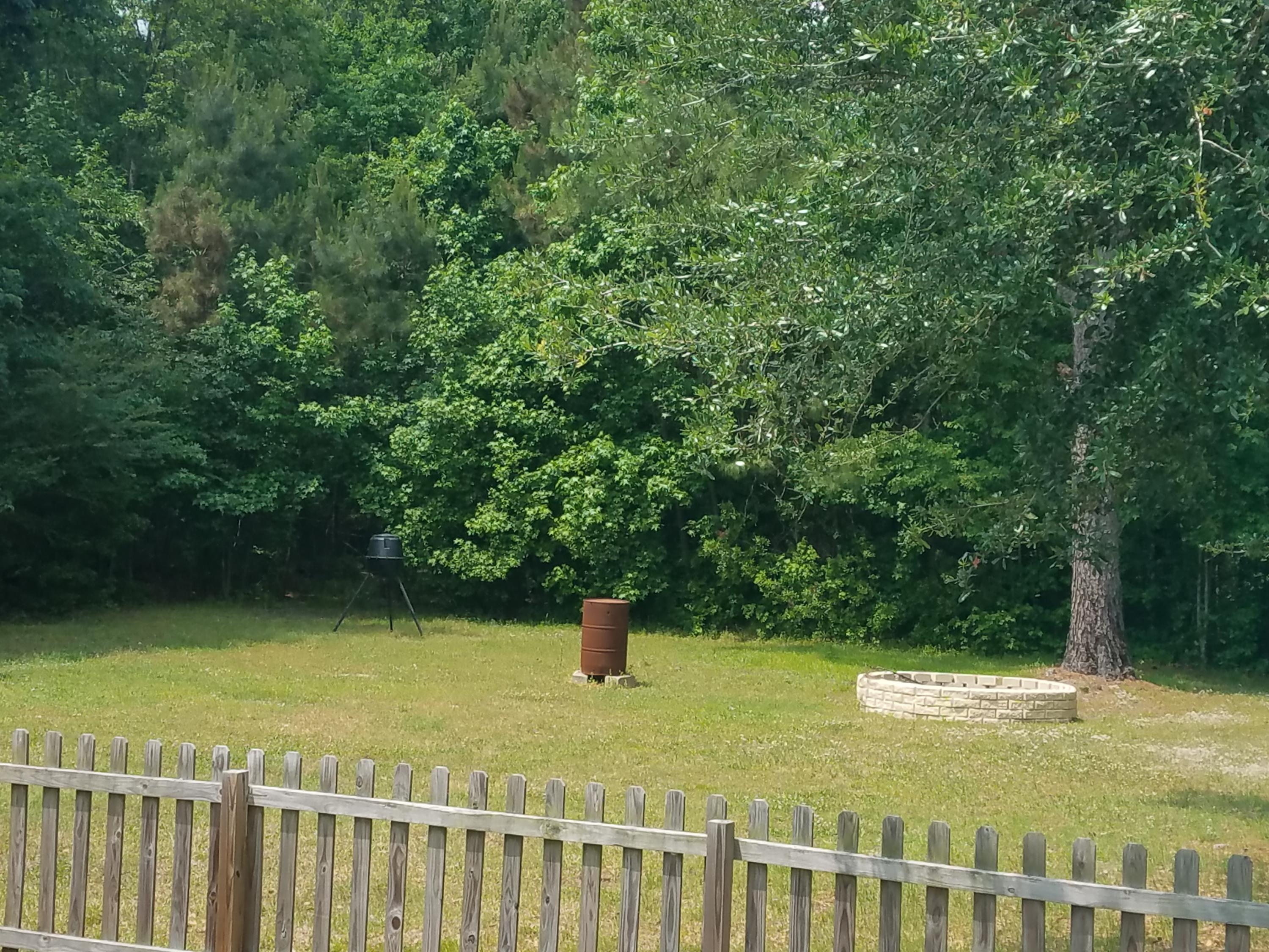 1234 County Line Road Cross, SC 29436 - Photo 32 of 36 Firepit and feeder