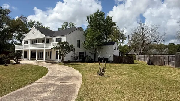 a view of a swimming pool with a backyard