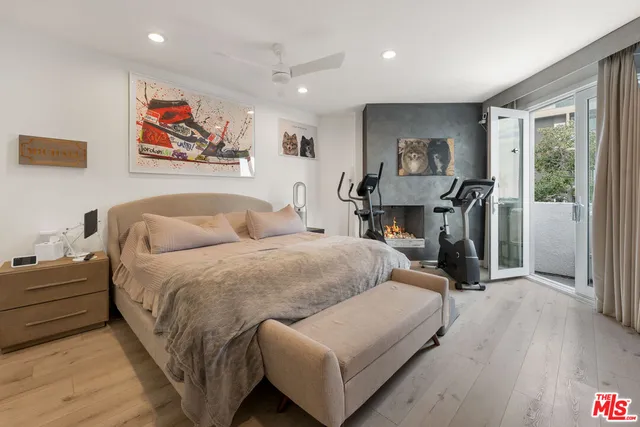 a bed room with bed and a window