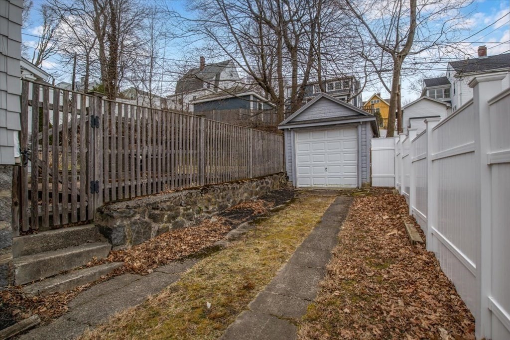 16 Sturges Road Boston, MA 02132 - Photo 29 of 34 a view of a house with a yard