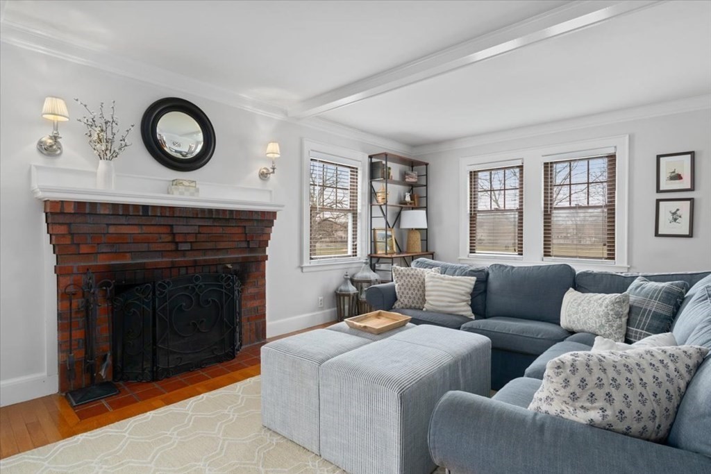 16 Sturges Road Boston, MA 02132 - Photo 6 of 34 a living room with furniture and a fireplace