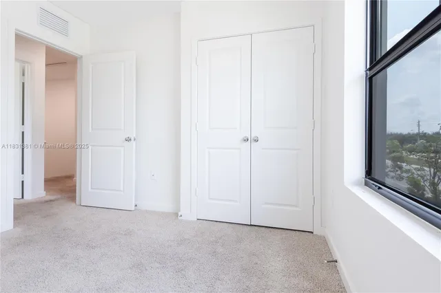 an empty room with a window