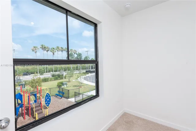 a view of a house with swimming pool patio and garden