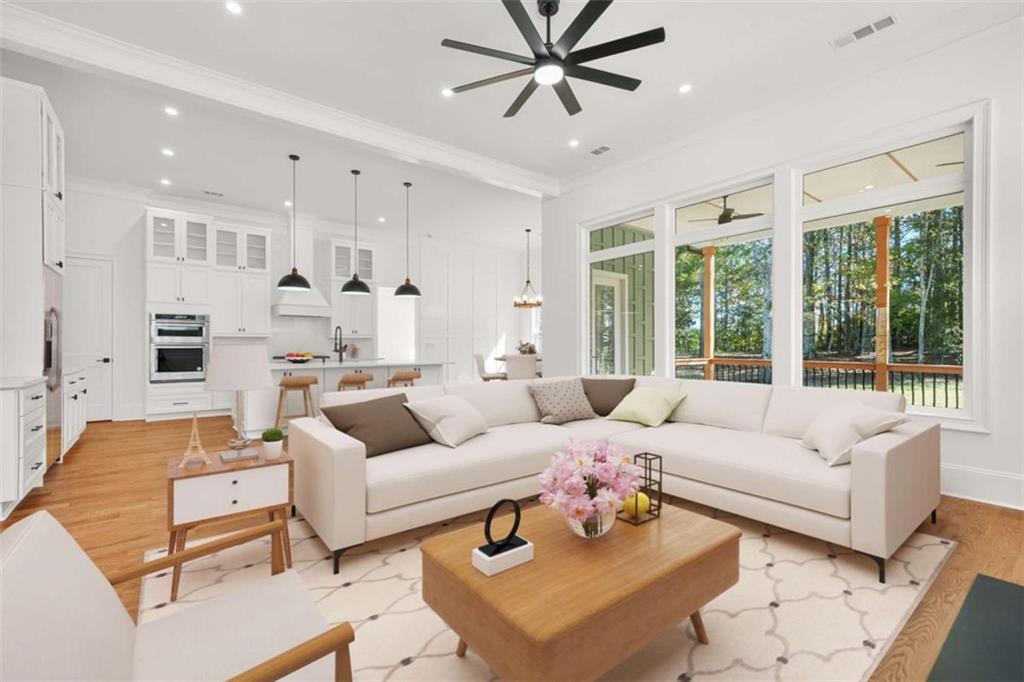 1525 Tapestry Ridge Southeast Lawrenceville, GA 30045 - Photo 11 of 49 a living room with furniture and a large window