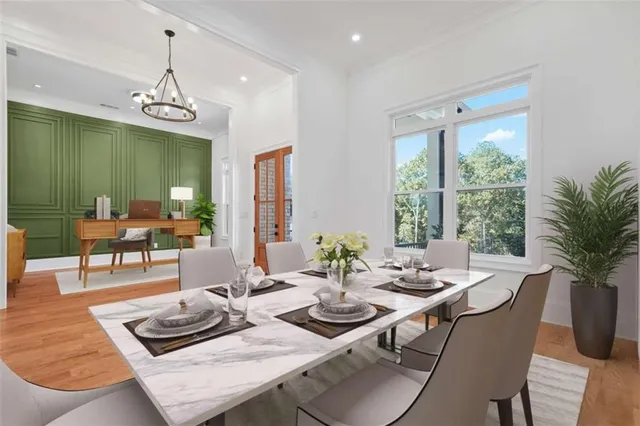a view of a dining room with furniture window and outside view