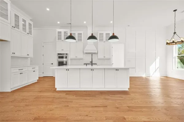 a bathroom with a double vanity sink and mirror