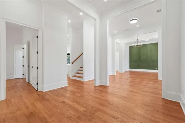a view of an empty room with a balcony