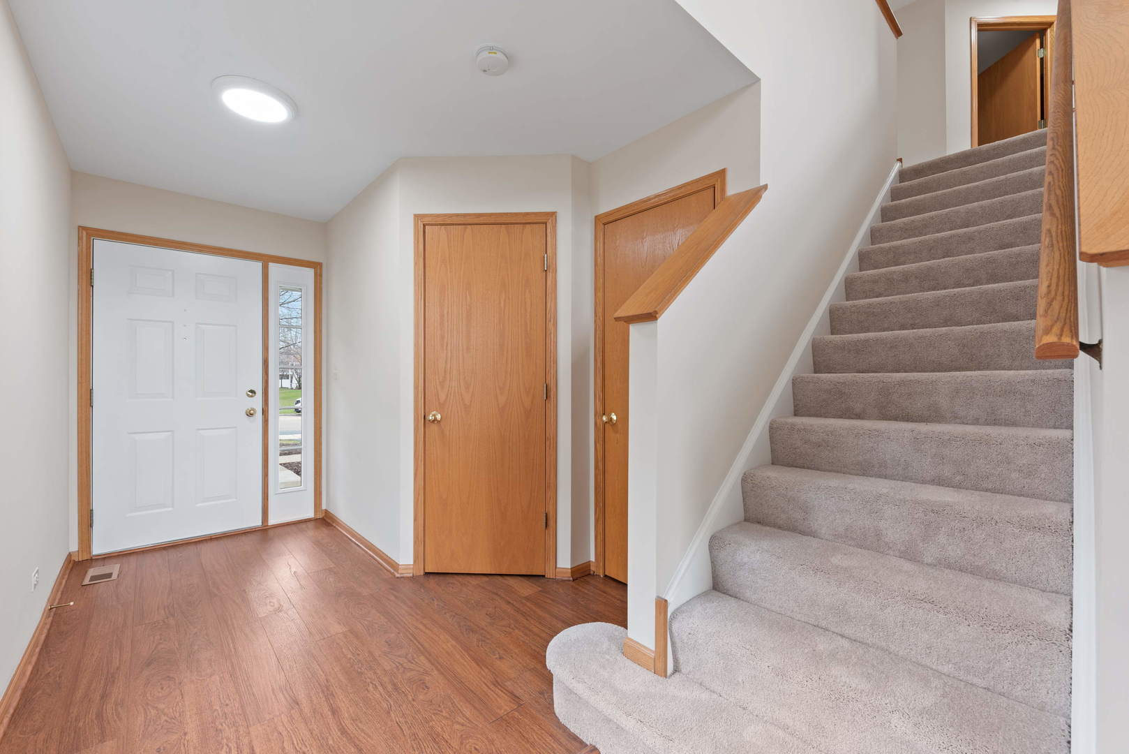 2267 Scott Lane Aurora, IL 60502 - Photo 5 of 22 a view of an entryway with wooden floor