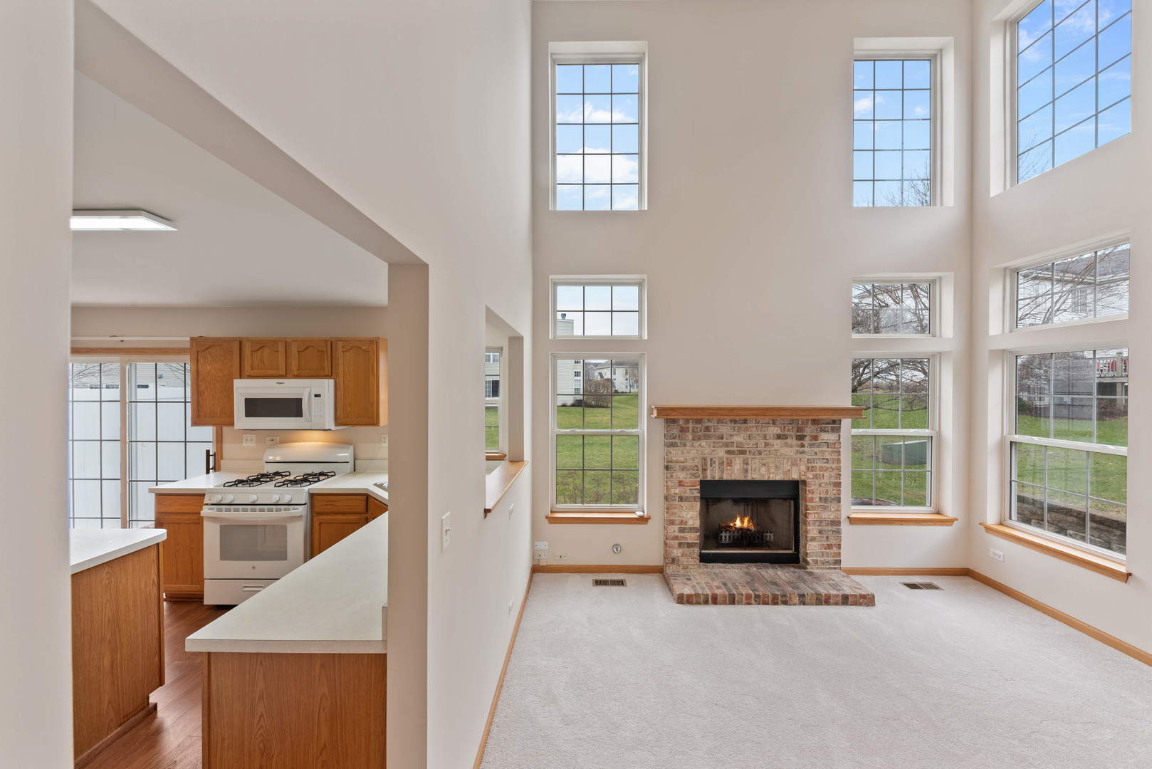 2267 Scott Lane Aurora, IL 60502 - Photo 9 of 22 a kitchen with stainless steel appliances granite countertop a stove and a refrigerator