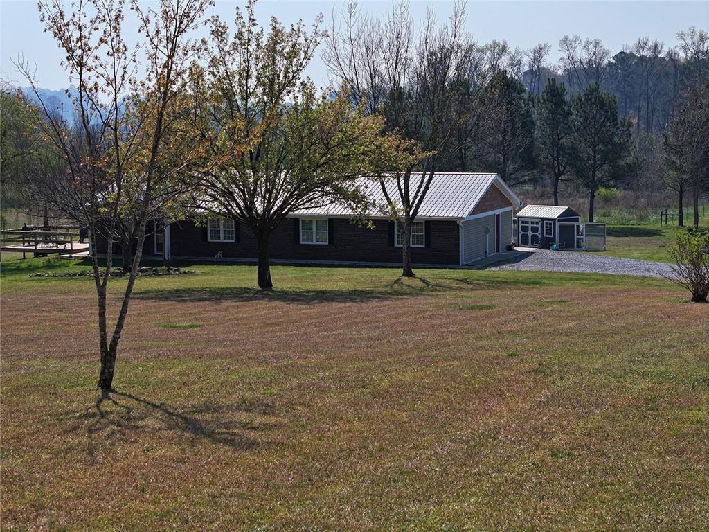 249 Cooper Road Southeast Calhoun, GA 30701 - Photo 3 of 62 a view of a house with a yard