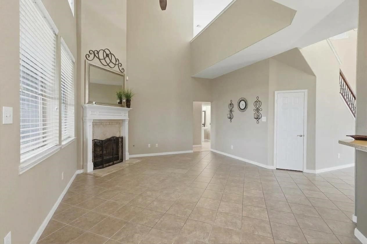 4838 Roaring Springs Road Pasadena, TX 77505 - Photo 11 of 38 Open layout dining and living spaces.
