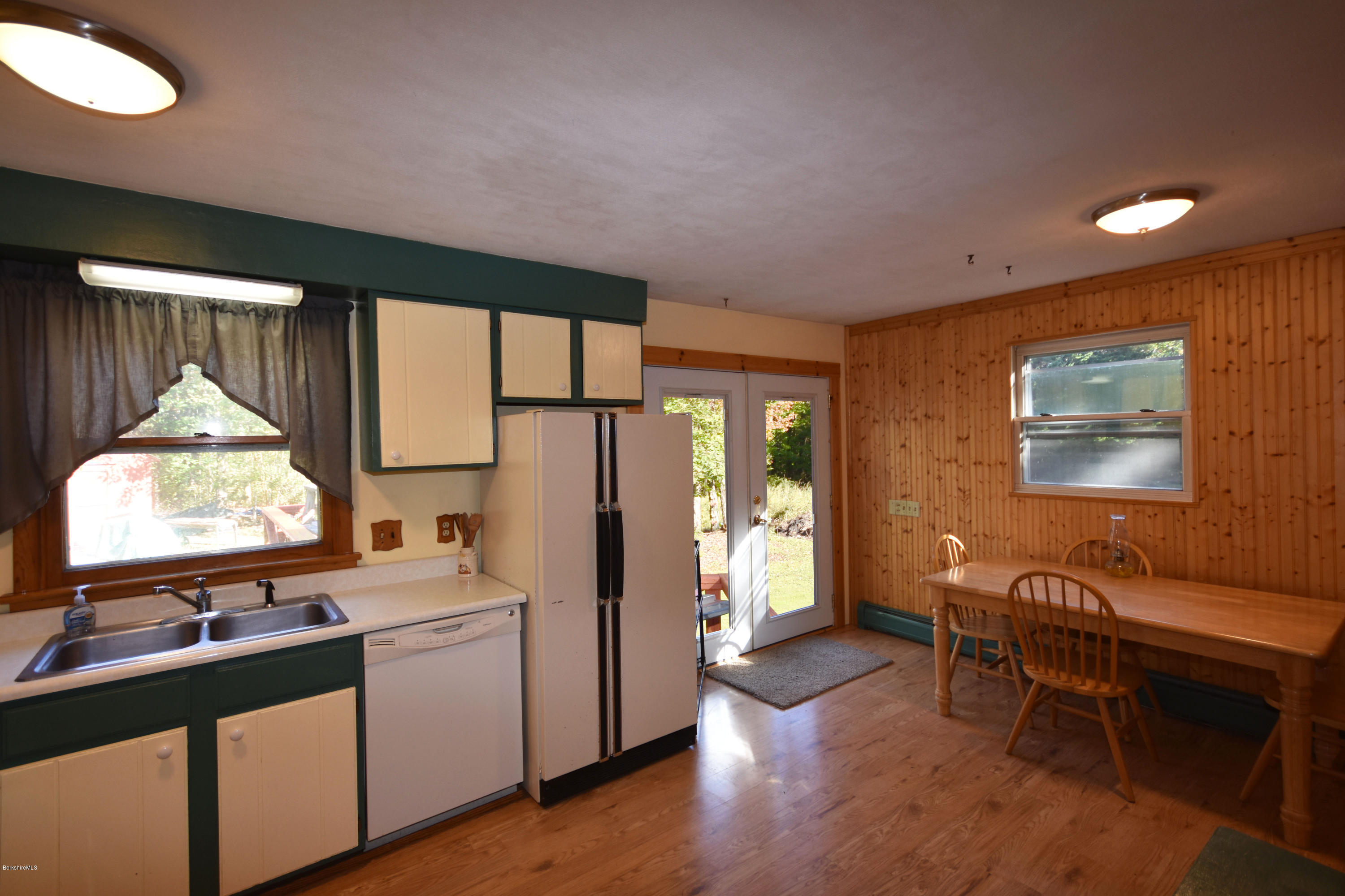239 East Windsor Road Peru, MA 01235 - Photo 12 of 38 a kitchen that has a microwave a sink and a refrigerator