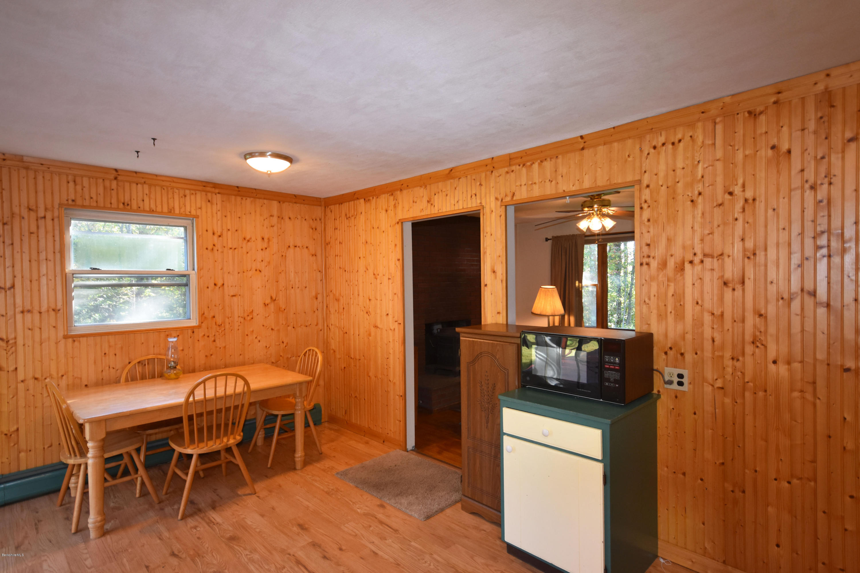 239 East Windsor Road Peru, MA 01235 - Photo 14 of 38 a view of a dining room with furniture and wooden floor