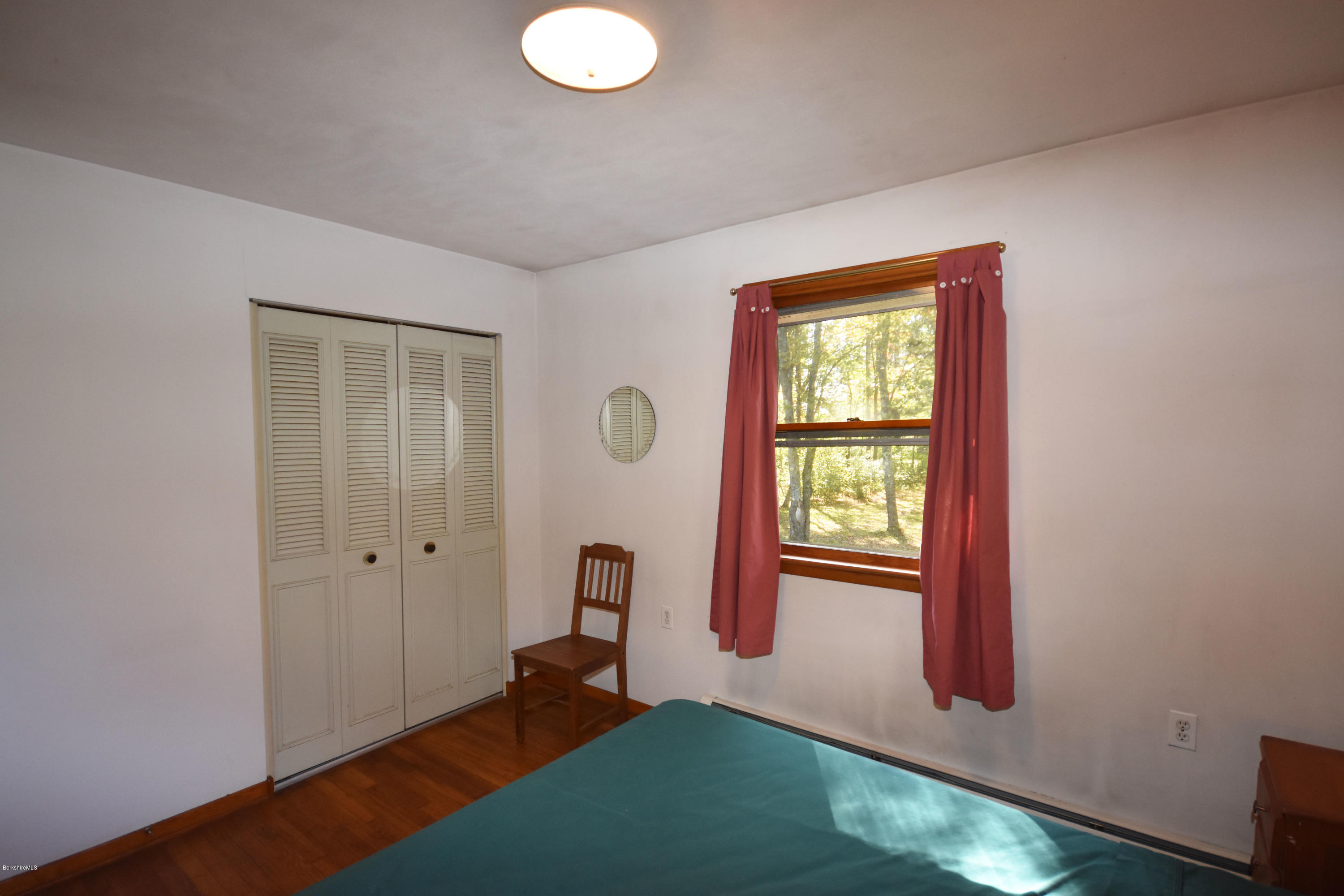 239 East Windsor Road Peru, MA 01235 - Photo 16 of 38 a view of a room with window wooden floor and windows